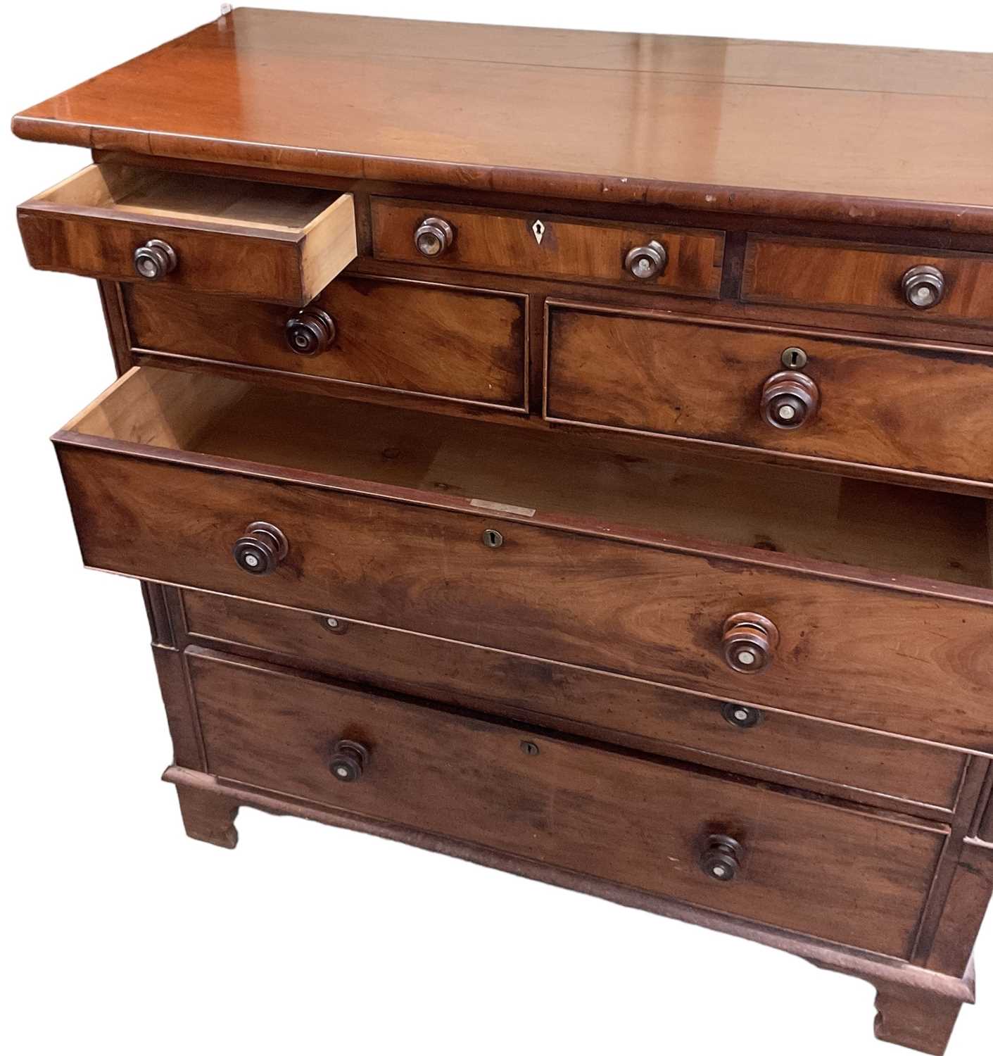 A Victorian mahogany chest of three cushion drawers over two short and three long drawers, width - Image 2 of 2