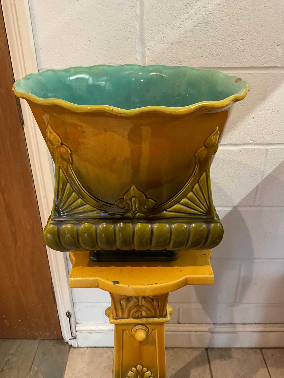 BRETBY; an early 20th century orange and dark khaki green glazed jardinière on stand, height - Image 2 of 4
