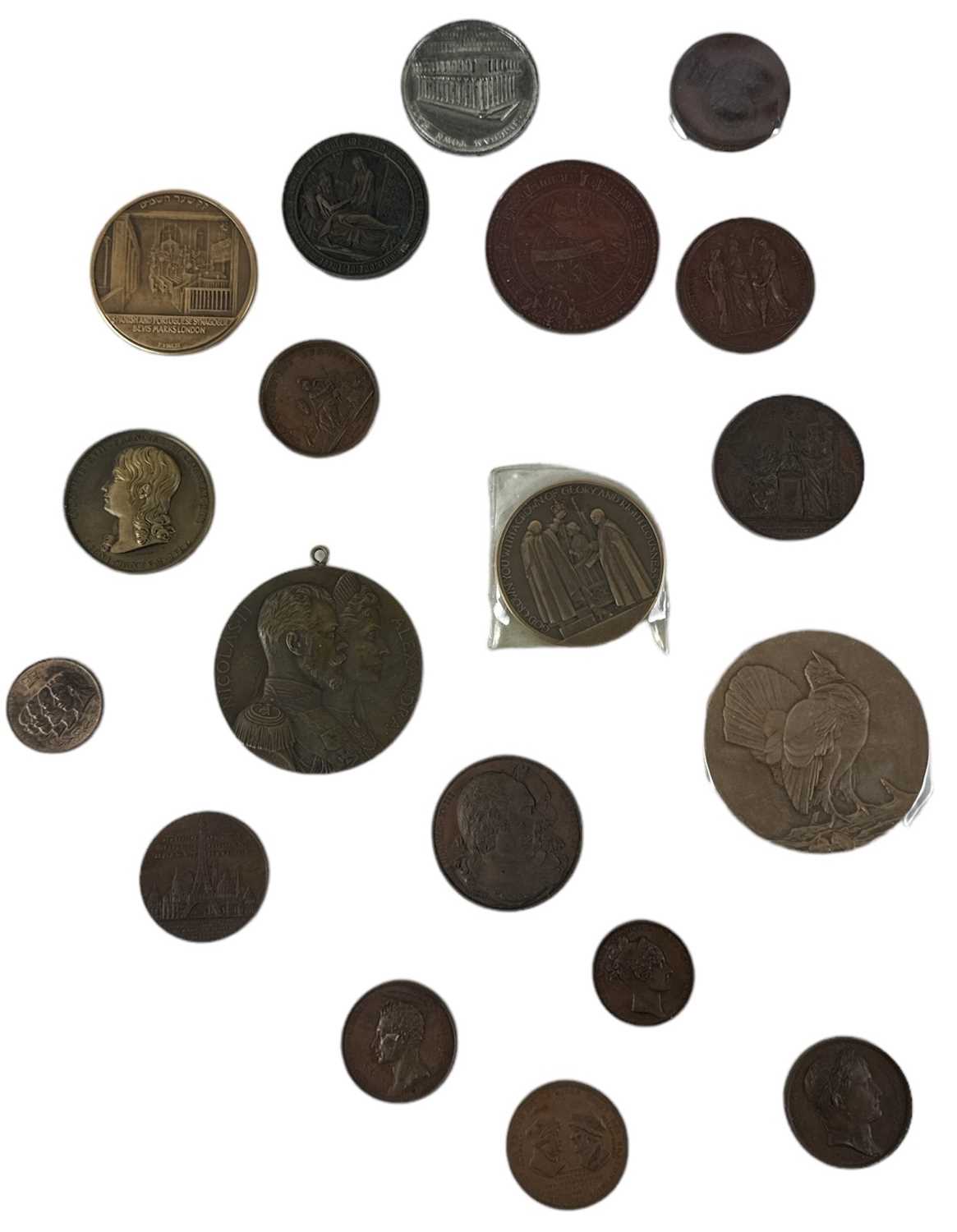 A collection of eighteen assorted commemorative medallions and souvenirs including bronze examples