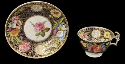 SPODE; a porcelain teacup and saucer decorated in the '1166' pattern, diameter of saucer 14cm,