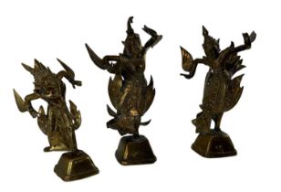 A set of three Indian brass models of Shiva, the tallest 18cm.