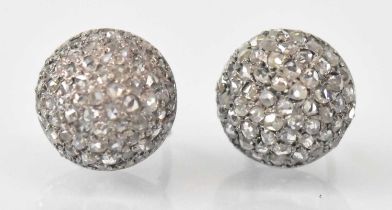 A pair of 9ct white gold diamond earrings set with multiple small diamonds, combined approx 5.5g.