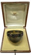 A Russian silver gilt cabochon and ruby set bowl, the base adorned with an Alexander III 25