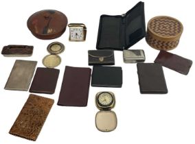A quantity of leather wallets and travelling clocks including Sloan, Seiko etc, together with two