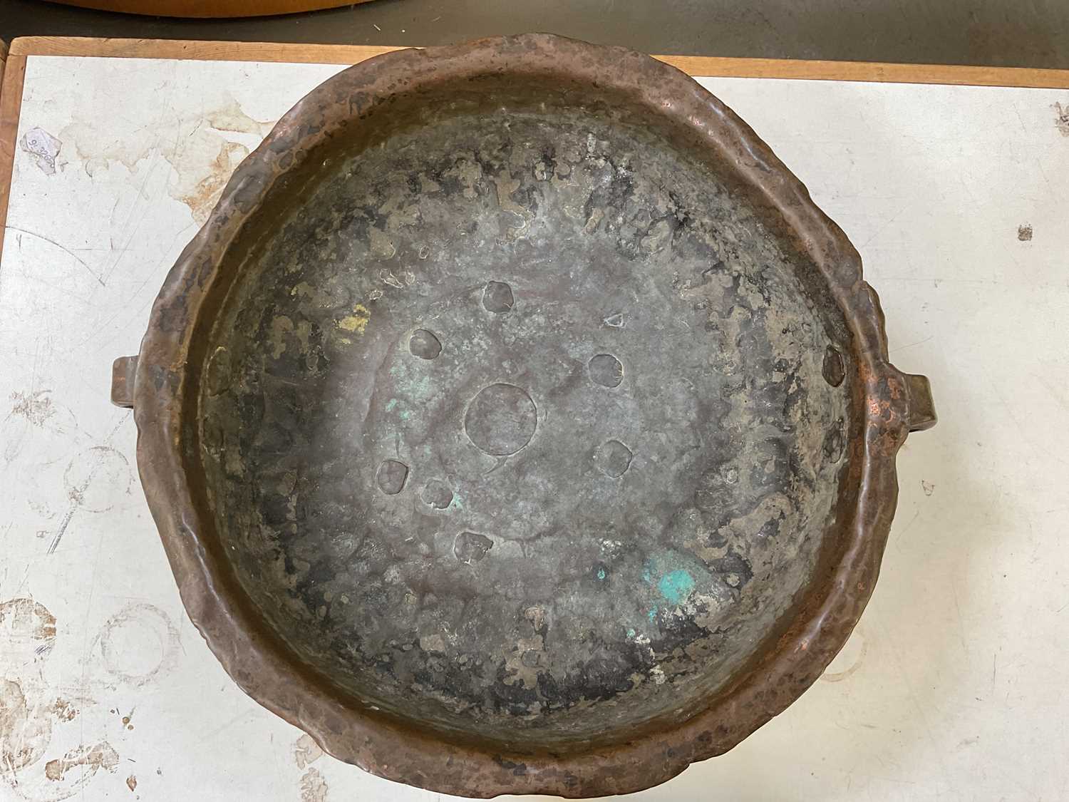 A large copper twin handled bowl, diameter 45cm. - Image 2 of 2