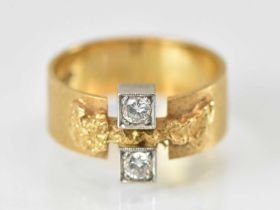 An 18ct yellow gold Finnish ring set with two small white stones, size N, approx 6.2g.