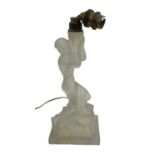 An Art Deco frosted glass figural table lamp in the form of a draped nude female, height to top of