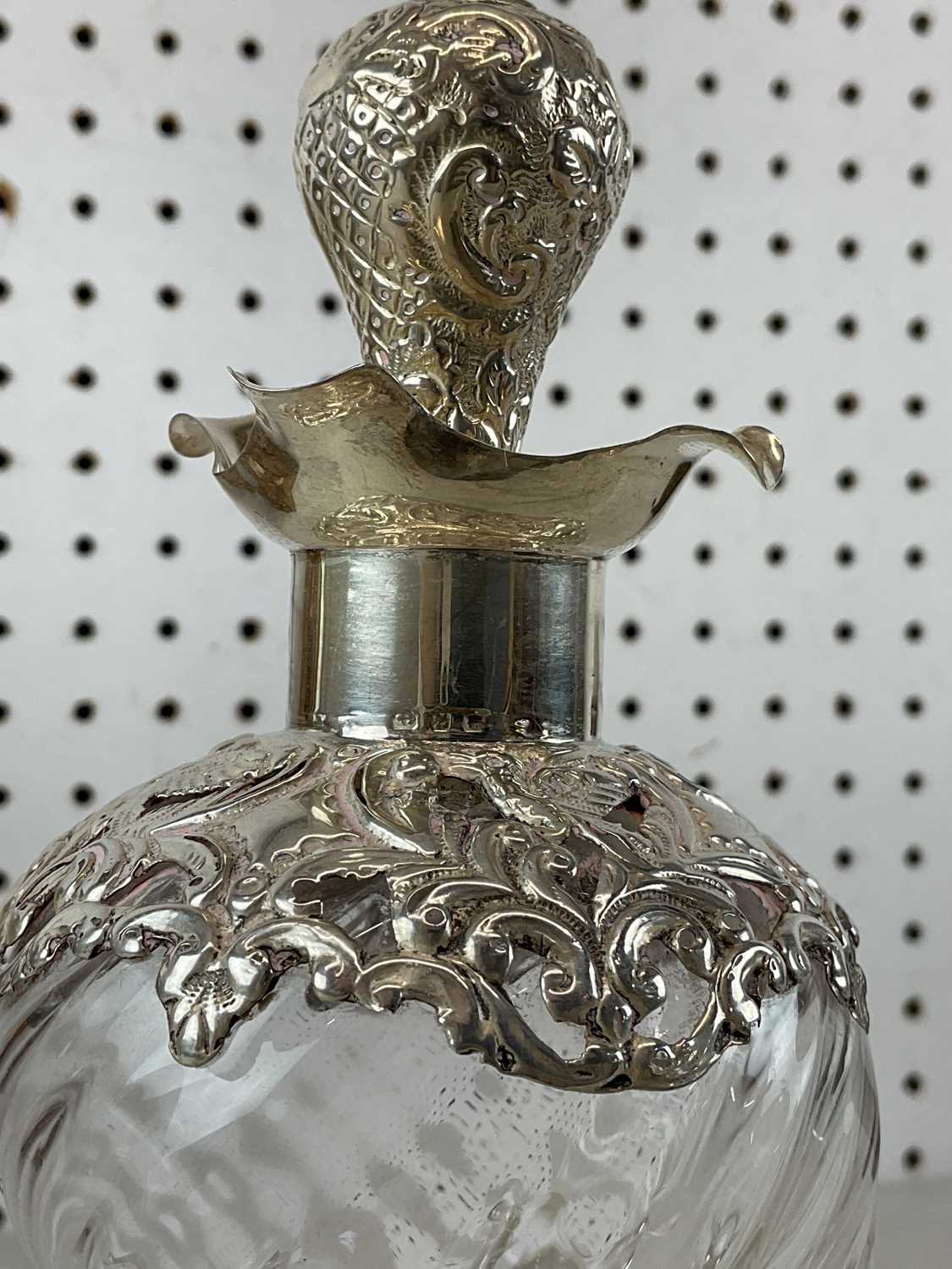 A late Victorian hallmarked silver mounted decanter, with hallmarked silver mounted stopper, - Image 2 of 2