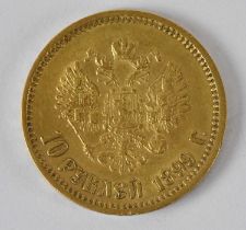 A Nicholas II 1899 ten rouble coin, diameter 2cm, approx 8.5g.