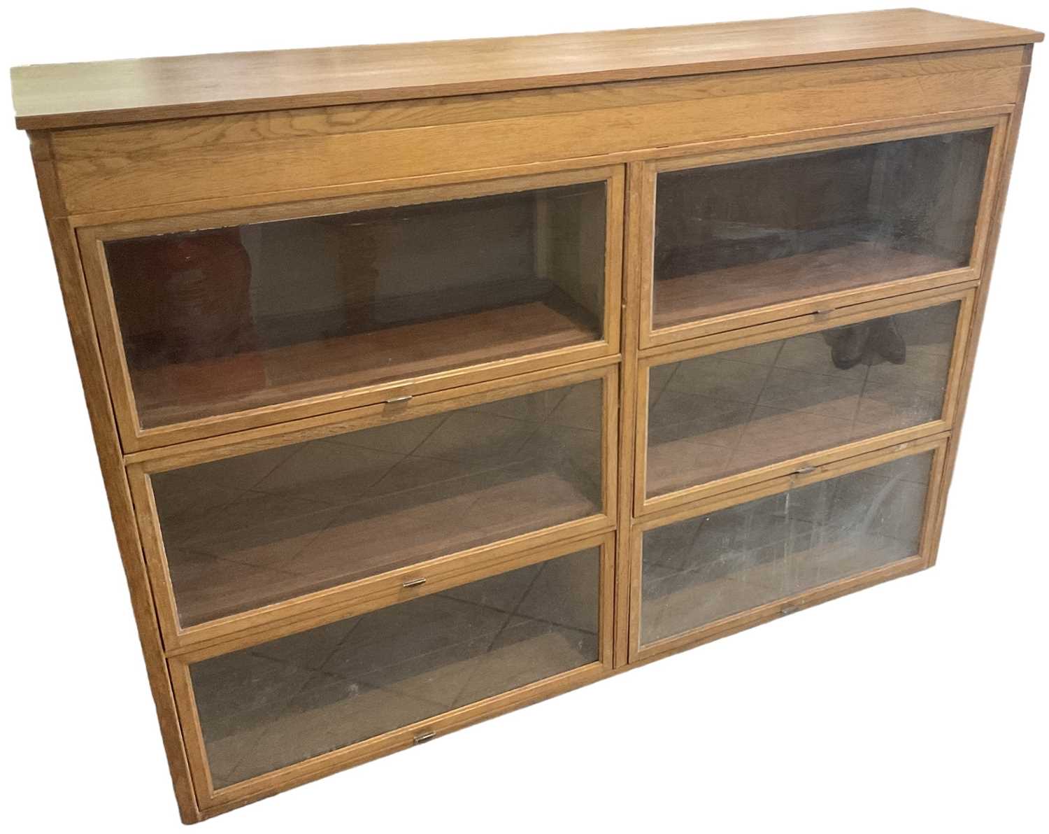 A pine six section glazed display cabinet with hinged lift-up glazed doors, width 170cm.