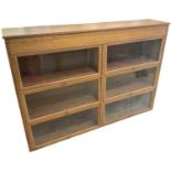 A pine six section glazed display cabinet with hinged lift-up glazed doors, width 170cm.