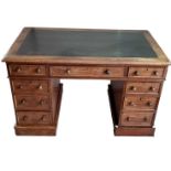 A Victorian mahogany pedestal desk with black leather insert top, width 122cm.