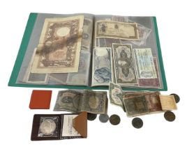 An album of all world banknotes including Italian, Brazilian, American etc, and a small quantity