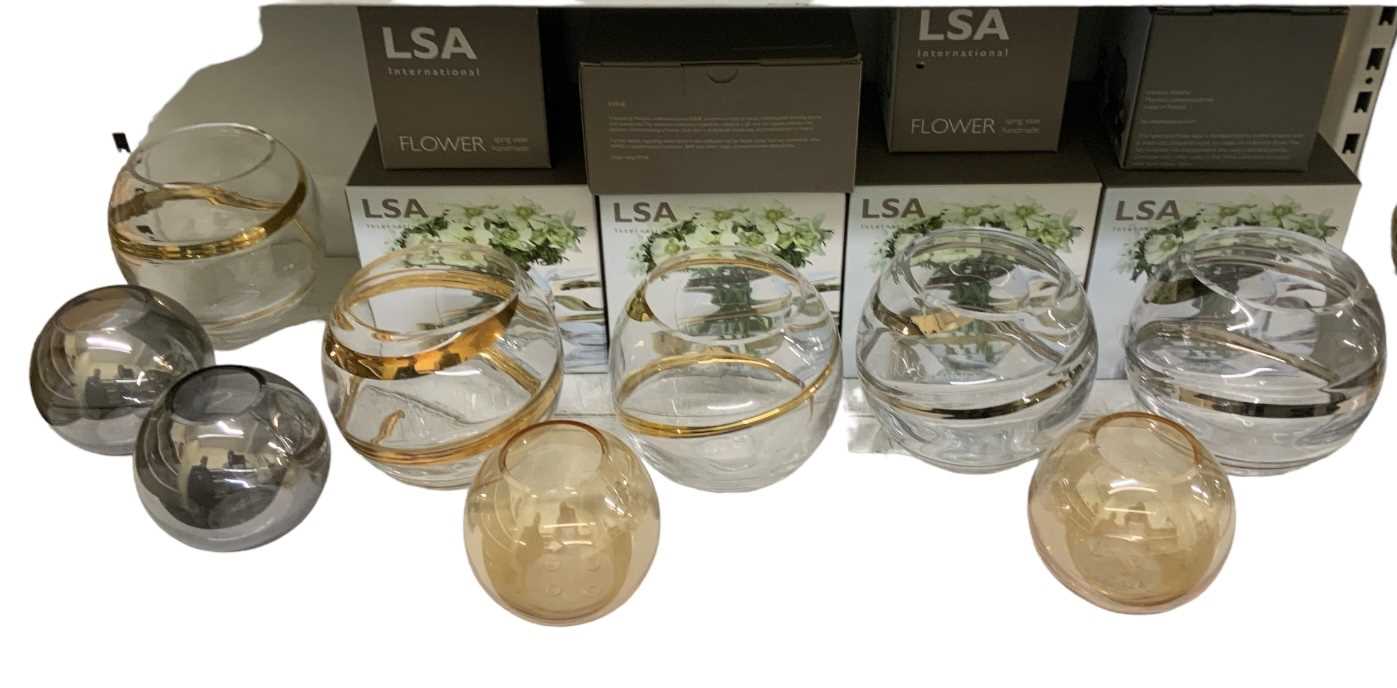LSA INTERNATIONAL; a group of coloured art glass vases including three small yellow vases, height