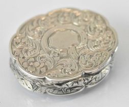 ASTON & SON; a Victorian hallmarked silver oval vinaigrette with engraved decoration and pierced