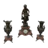 A 19th century pink marble and gilt metal mounted spelter figural mantel clock, 'A La Fontaine',
