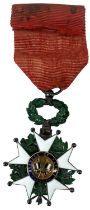 A French Legion of Honour white and green enamelled medal dated 1870, inscribed 'République