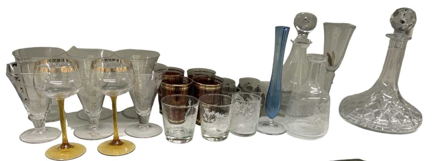 A quantity of cut and crystal glass including a ship's decanter, another decanter, six etched