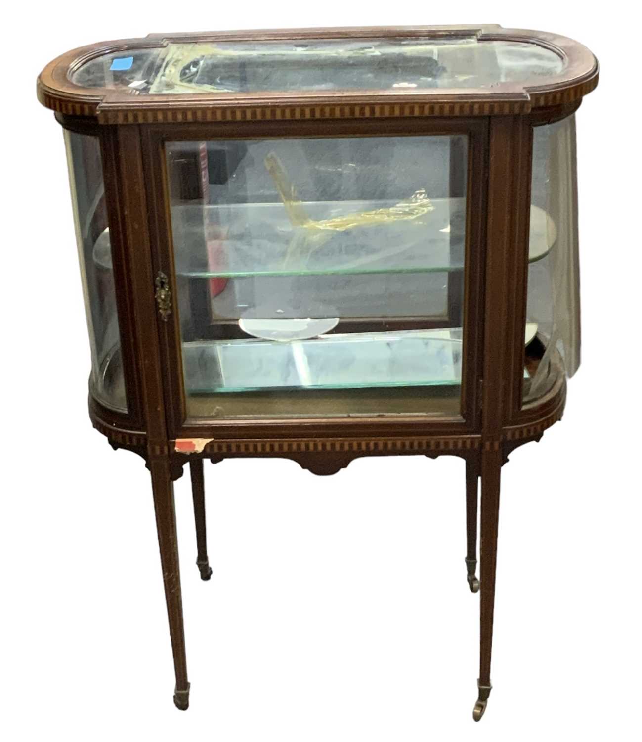 An Edwardian mahogany and inlaid oval display cabinet/bijouterie table, width 69cm, depth 39cm,