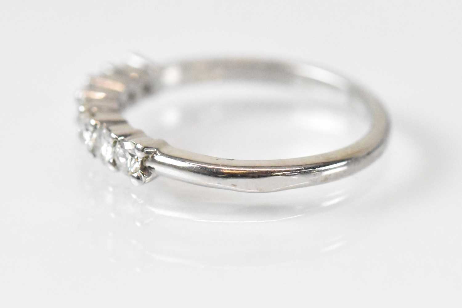 An 18ct white gold seven stone diamond ring, size K/L, approx 2.7g. - Image 2 of 3