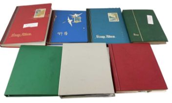 A group of albums of first day covers and all world stamps.