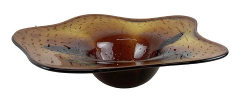 An amber coloured art glass bowl, diameter 37cm.