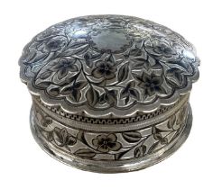 An Italian white metal niello work circular floral decorated lidded trinket box, diameter 7cm.