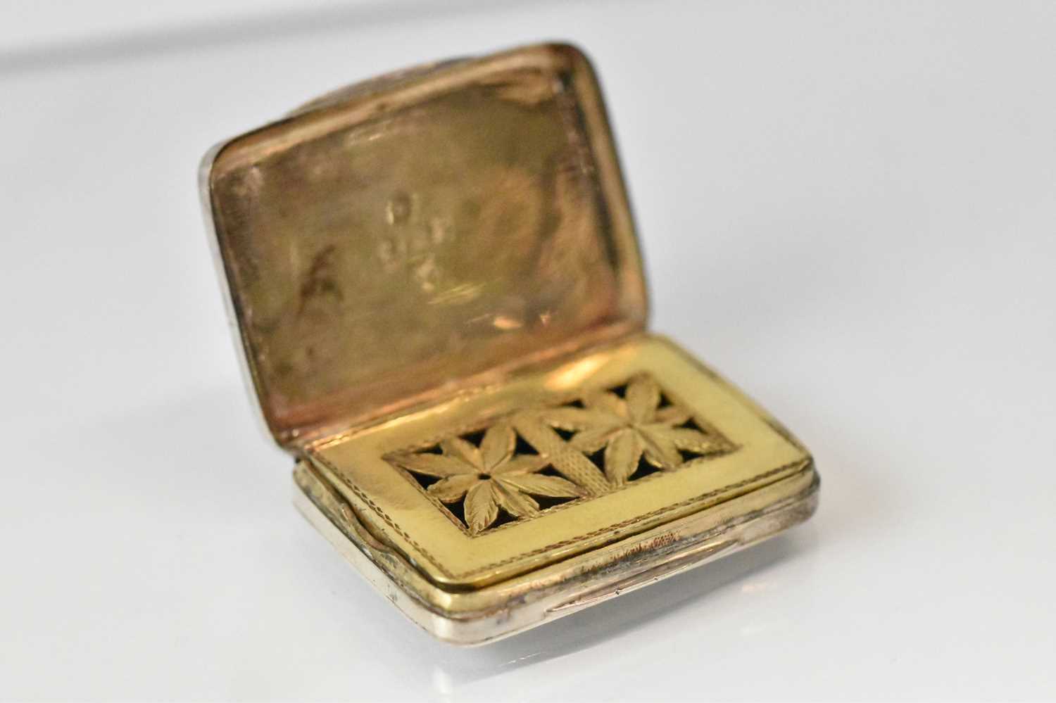 SAMUEL PEMBERTON; a George III hallmarked silver plain rectangular vinaigrette with gilt interior, - Image 2 of 4