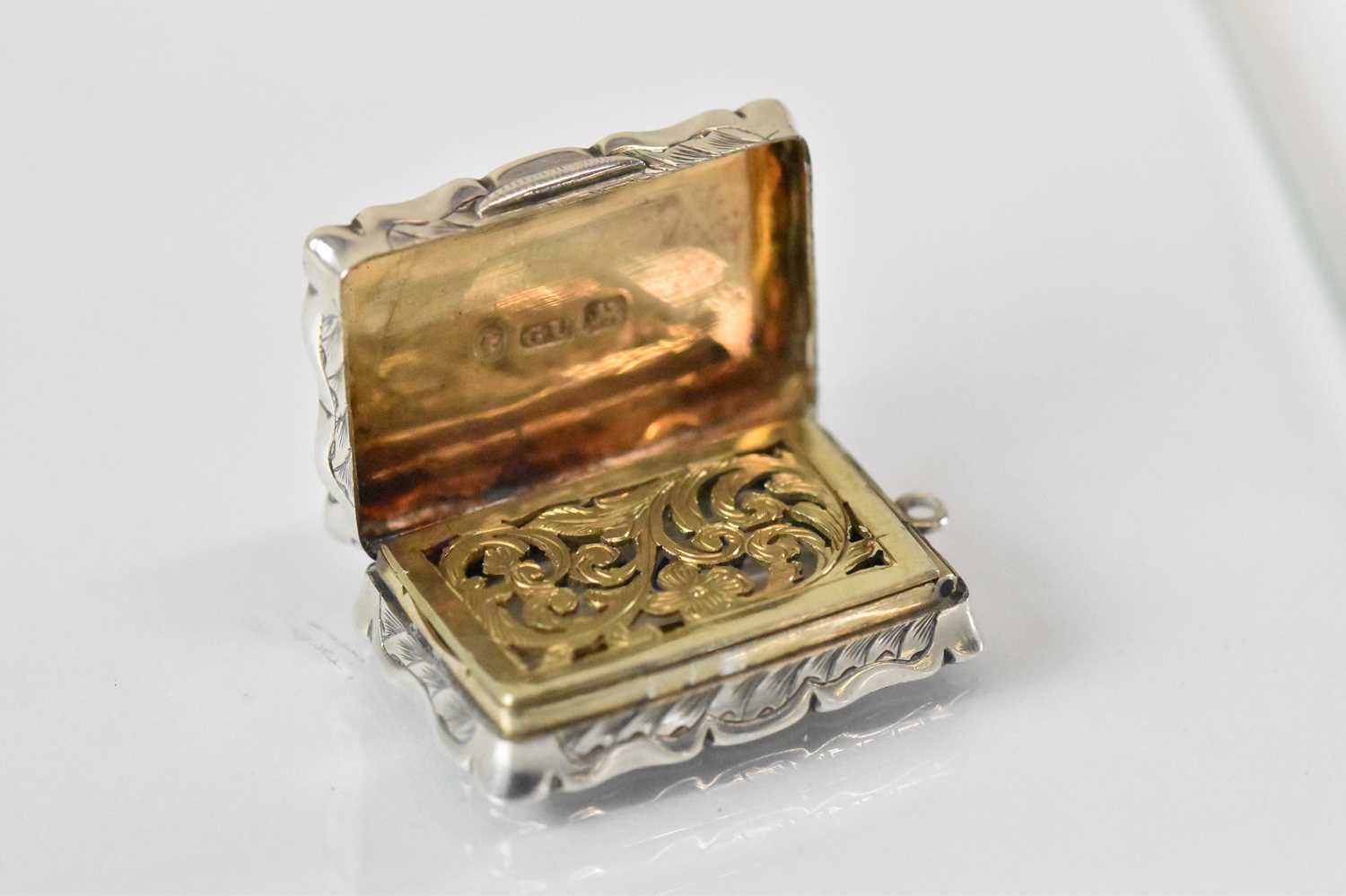 GEORGE UNITE; a Victorian hallmarked silver vinaigrette with gilt interior, Birmingham 1869, 3.5 x - Image 2 of 3