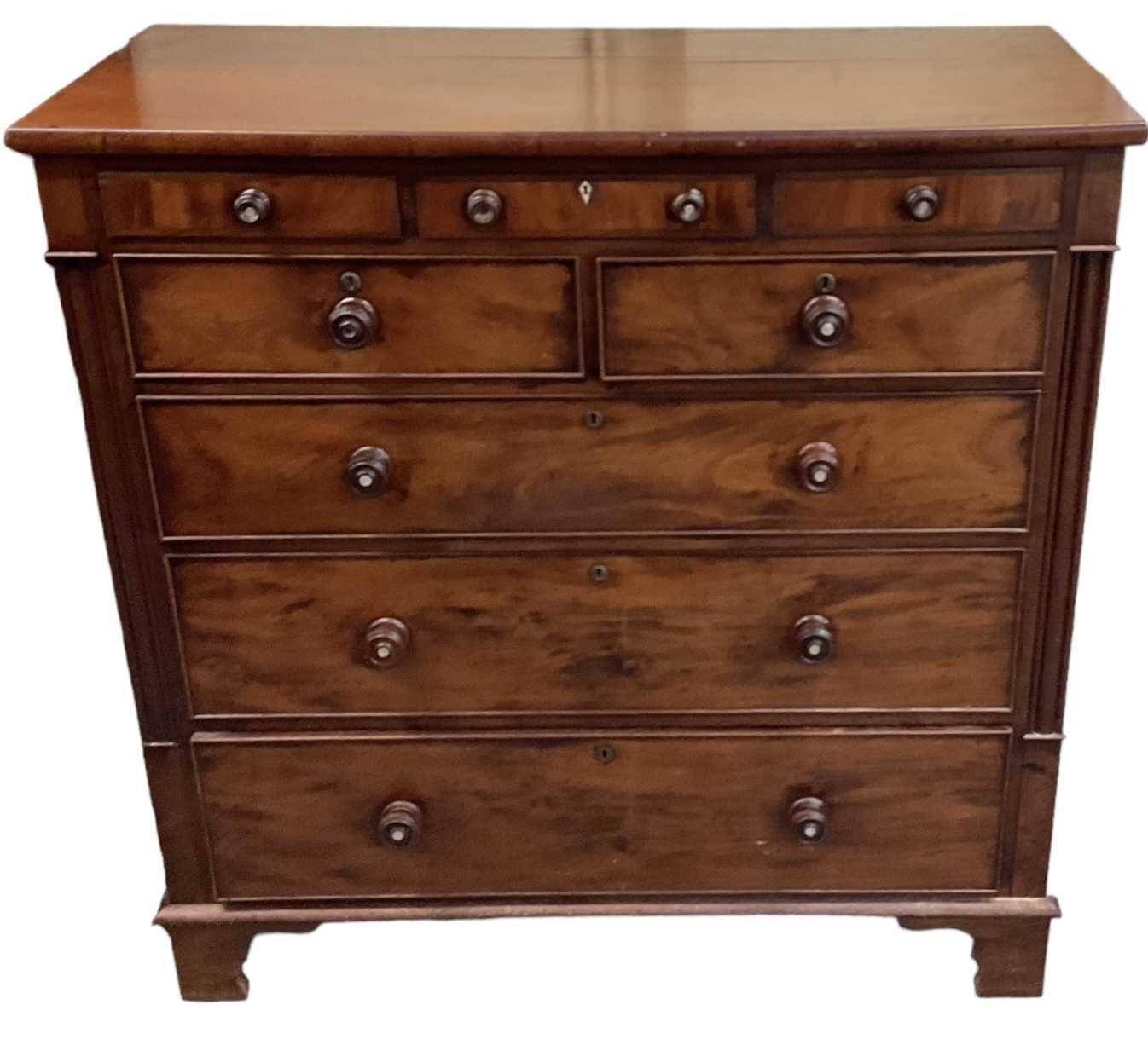 A Victorian mahogany chest of three cushion drawers over two short and three long drawers, width