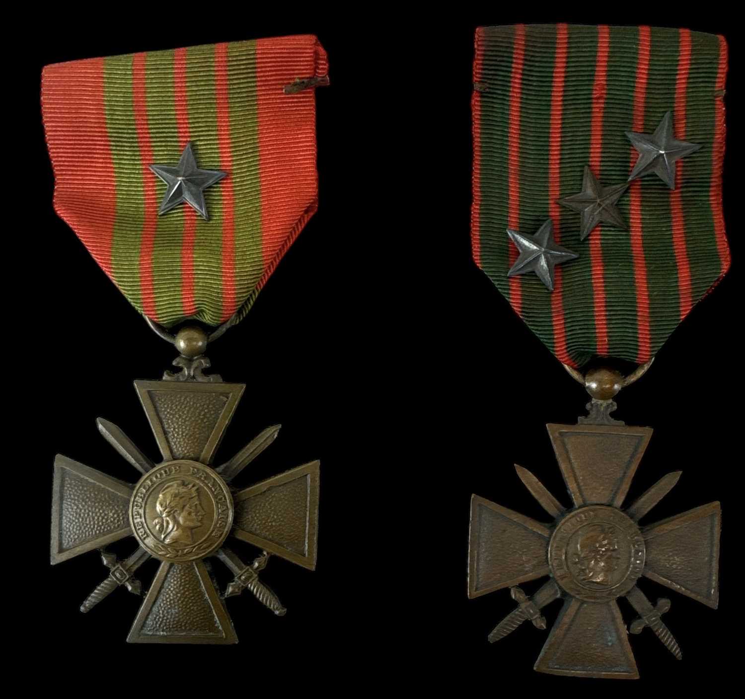 A French Croix de Guerre 1939 bronze star medal and a French Croix de Guerre 1914-15 issue bronze