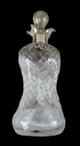 A late Victorian hallmarked silver mounted decanter, with hallmarked silver mounted stopper,