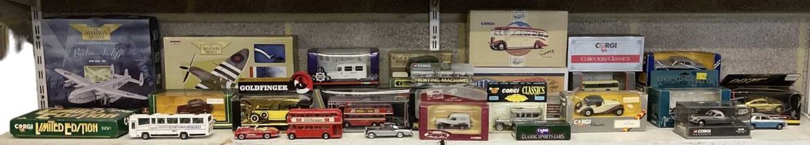 CORGI; a group of approximately twenty-five cased model diecast vehicles and models, including the