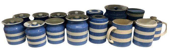 A quantity of Cornish blue and white kitchenware including eleven lidded jars, two further jars, a