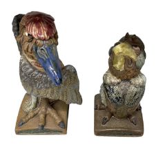 BURSLEM POTTERY; two grotesque birds, inspired by Martin Brothers' birds, both signed to the base,