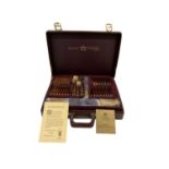 BESTECKE SOLINGEN; a leather cased twelve setting canteen of gold plated cutlery, stamped '23/24