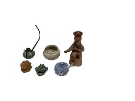 A group of collectors' items including a Benin type bronze pin dish modelled as a face, height