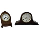 A 20th century mahogany cased mantel clock, the white enamel dial set with Roman numerals, and a