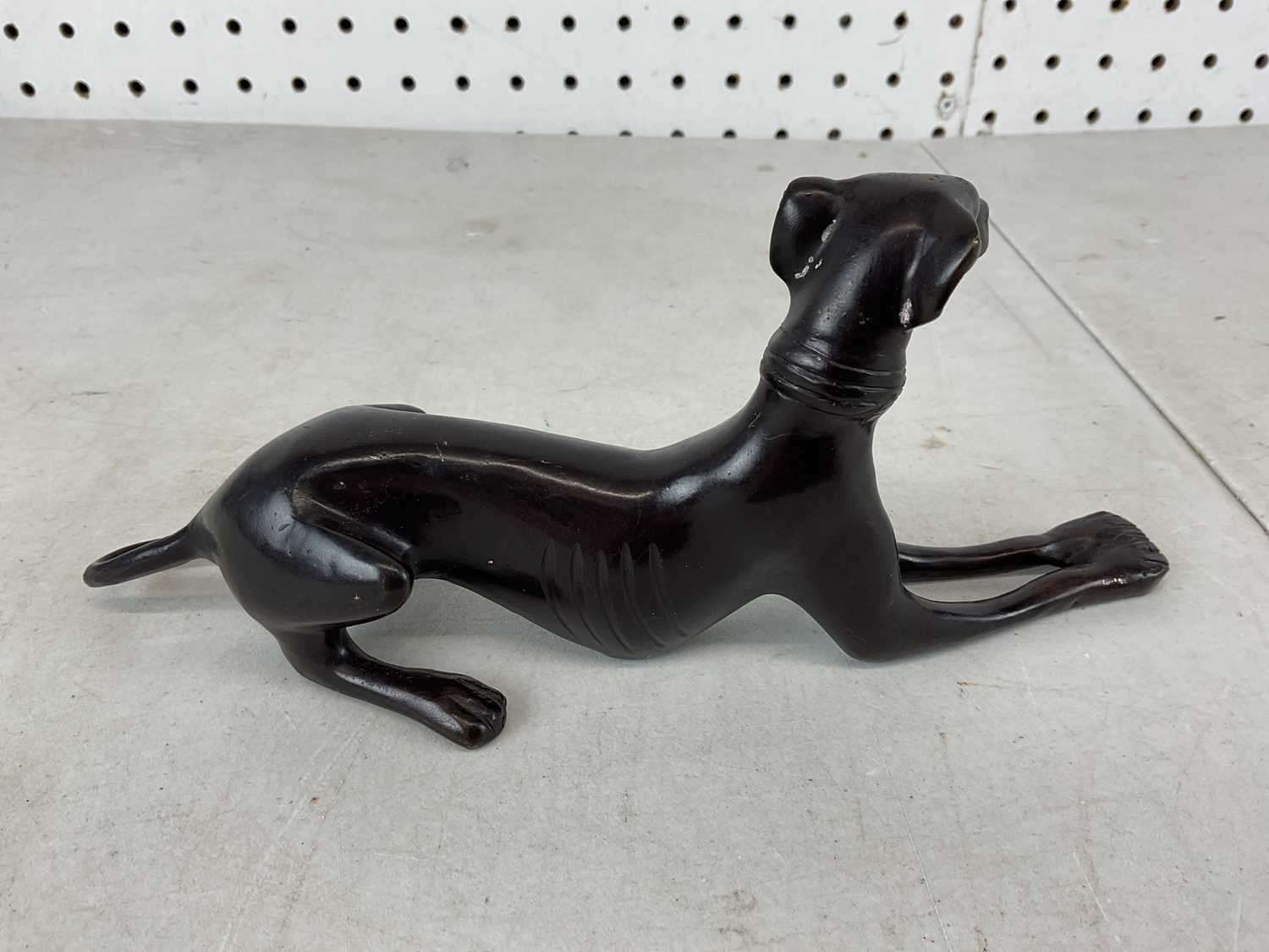 A white bronzed metal of a greyhound, height 9cm, length 21cm. - Image 2 of 2