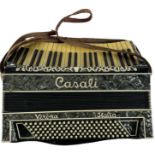 CASALI III; a cased Italian piano accordion.