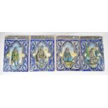 A set of four 18th/19th century large Persian tiles with raised detail and each centred with a
