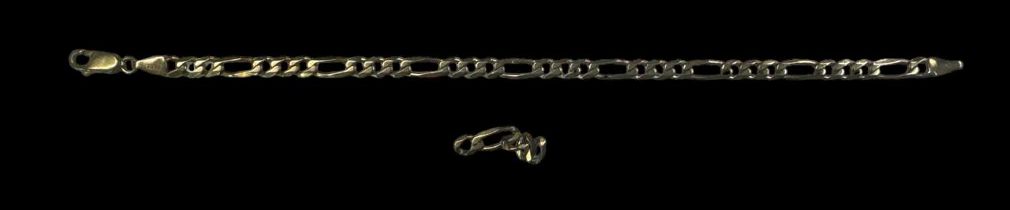 A 9ct yellow gold bracelet with two spare links, length 18cm, approx 5.7g.