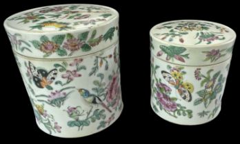 A Chinese Famille Rose porcelain lidded jar decorated with birds amongst foliage, diameter 10.5cm,
