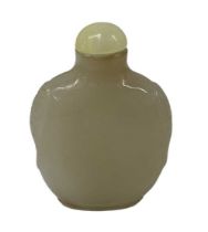 A Chinese carved green jade scent bottle, height 7cm.