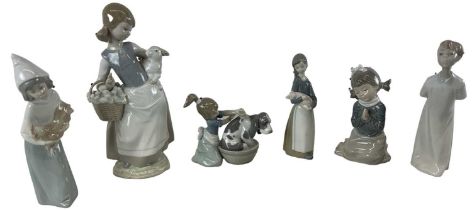 LLADRÓ ; a group of five ceramic figures of young girls and a similar Nao figure (6).