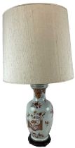 A modern Japanese porcelain floral decorated table lamp, on carved hardwood base, height to top of