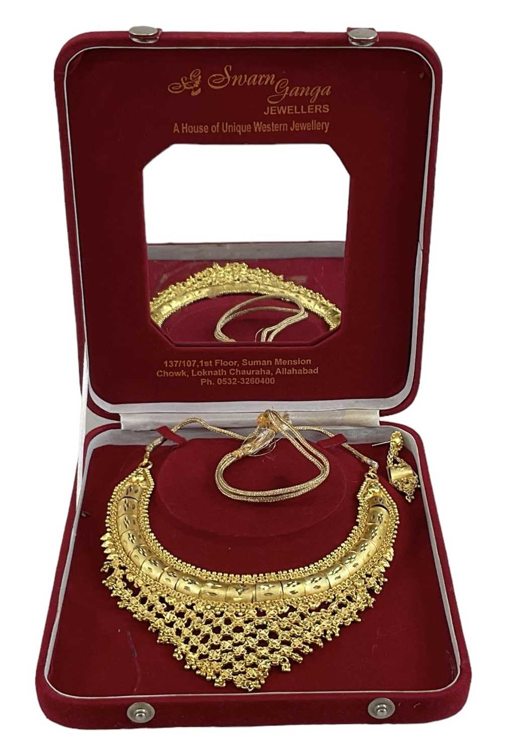 A yellow metal Pakistani wedding gift necklace, with gold drop tassels, and matching earring, - Image 3 of 4