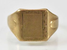 A 9ct yellow gold signet ring (cut), approx 4.7g.