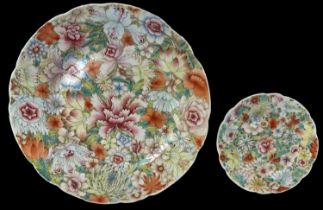 A Chinese floral decorated plate, diameter 23cm, and a matching porcelain floral decorated saucer,