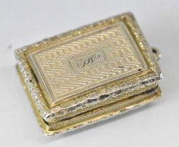 JOHN BETTRIDGE; a George IV hallmarked silver vinaigrette with elaborate pierced gilt interior,